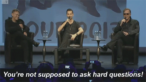 Group saying 'You're not supposed to ask hard questions!'
