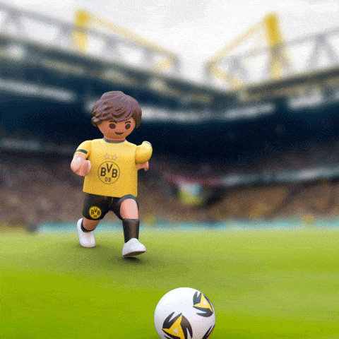 PLAYMOBIL toy figures playing soccer